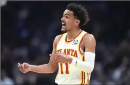  ?? NICK CAMMETT — THE ASSOCIATED PRESS ?? Atlanta Hawks guard Trae Young reacts to a foul call during the first half of the team's NBA play-in basketball game against the Cleveland Cavaliers on Friday in Cleveland.