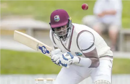  ?? (Photo: AFP) ?? West Indies Captain Jason Holder avoids a high ball during the third day of the first Test match against New Zealand at Seddon Park in Hamilton, recently.