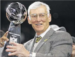  ?? JEFF HAYNES / AFP / GETTY IMAGES 2006 ?? Then-Pittsburgh Steelers team owner Dan Rooney holds the Vince Lombardi trophy after his team won Super Bowl XL, 21-10, against the Seattle Seahawks in 2006. Dan Rooney’s team garnered six Super Bowl trophies in three decades.