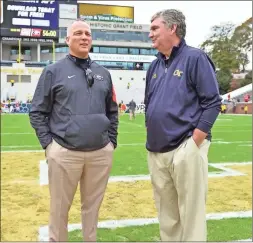  ?? Ted mayer ?? Georgia head coach Mark Richt and Georgia Tech head coach Paul Johnson talk before the game at midfield.