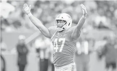  ?? JOHN MCCALL/SOUTH FLORIDA SUN SENTINEL ?? Dolphins linebacker Vince Biegel celebrates a strip sack against the Bengals at Hard Rock Stadium on Dec. 22, 2019. He suffered a torn left Achilles tendon in Tuesday’s practice.