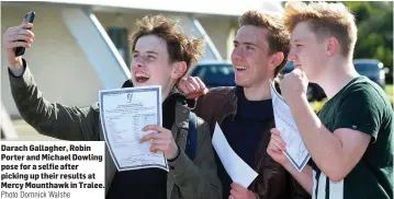  ?? Photo Domnick Walshe ?? Darach Gallagher, Robin Porter and Michael Dowling pose for a selfie after picking up their results at Mercy Mounthawk in Tralee.