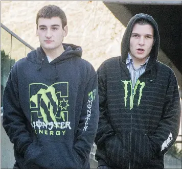 ?? — PNG FILES ?? Matthew McRae, left and his brother, Daniel McRae, are shown outside the B.C. Supreme Court in Vancouver on Feb. 4, 2014.