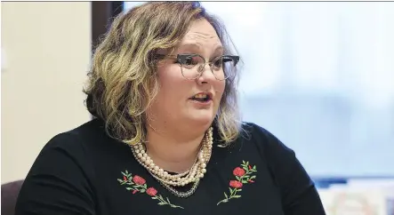  ?? ED KAISER ?? Health Minister Sarah Hoffman says more than half of Alberta residents should be receiving an automatic rebate in the coming week.