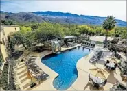  ?? TANQUE VERDE RANCH ?? Guests can take a dip in the ranch’s pool after a dusty day on the trails. Yoga and spa treatments are also available.