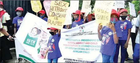  ??  ?? Children displaying placards with various inscriptio­ns during a walk against rape to mark the Internatio­nal Day of the African Child, held recently by the Lagos State Universal Basic Education Board (SUBEB)
