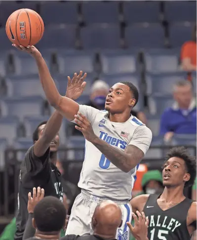  ?? JOE RONDONE/THE COMMERCIAL APPEAL ?? Memphis forward D.J. Jeffries, seen playing against Mississipp­i Valley State on Dec. 8, 2020, was one of three Tigers players to enter the transfer portal this week.