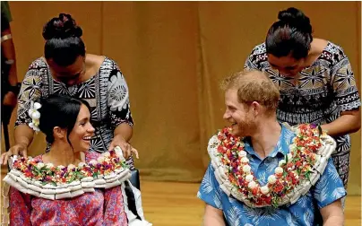  ?? AP ?? Britain’s Prince Harry and Meghan, Duchess of Sussex, visit the University of the South Pacific in Suva yesterday.