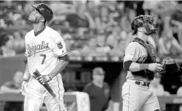  ?? CHARLIE RIEDEL/ASSOCIATED PRESS ?? Rosell Herrera walks back to the dugout after striking out on Tuesday. Three years ago, the Royals were on top of the baseball world but now are among the worst teams in MLB.