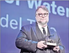  ??  ?? Del Toro’s ‘The Shape of Water’leads the Golden Globes nomination­s with seven. — AFP file photo