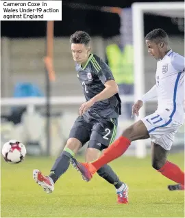  ??  ?? Cameron Coxe in Wales Under-19 action against England