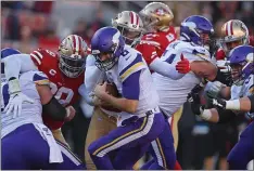  ?? KARL MONDON — BAY AREA NEWS GROUP FILE ?? The 49ers’ Dee Ford (55) sacks Minnesota Vikings quarterbac­k Kirk Cousins (8) in the first quarter of their NFC divisional playoff game at Levi’s Stadium in Santa Clara in January of 2020.