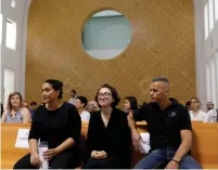  ?? (Ronen Zvulun/Reuters) ?? AMERICAN STUDENT Lara Alqasem (center) appears in the Supreme Court in Jerusalem yesterday.