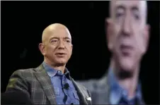  ?? AP PHOTO/JOHN LOCHER ?? In this June 6, 2019, file photo Amazon CEO Jeff Bezos speaks at the the Amazon re:MARS convention in Las Vegas. Washington state’s richest residents, including Bezos and Bill Gates, would pay a wealth tax on certain financial assets worth more than $1 billion under a proposed bill whose sponsor says she is seeking a fair and equitable tax code.