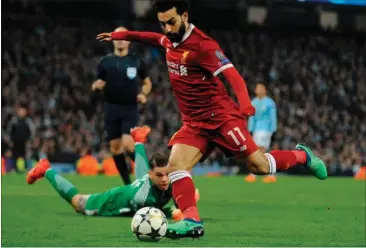  ?? FOTO: AP ?? Agger er ganske imponeret over det, Sadio Mané, Roberto Firmino og ikke mindst Mohamed Salah (foto) har udrettet i denne saeson. Trioen har scoret 90 mål i saesonen. Salah har lavet svimlende 44, Firmino 27, og Mané 19.