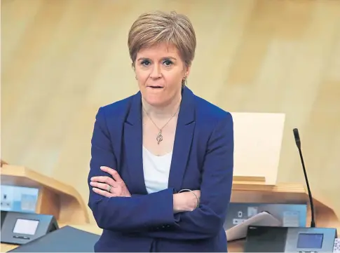  ??  ?? UNDER FIRE: First Minister Nicola Sturgeon during First Minster’s Questions in the Scottish Parliament yesterday.