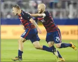  ?? AP/BEN MARGOT ?? United States' Jordan Morris (8) and Michael Bradley celebrate after Morris’ goal against Jamaica during the Gold Cup final in Santa Clara, Calif.