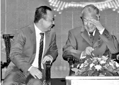  ??  ?? Dr Mahathir (right) shedding tears a er delivering his speech at the launching of the National Teachers’ Day celebratio­n while being consoled by Maszlee. - Bernama photo