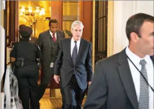  ?? DOUG MILLS/THE NEW YORK TIMES ?? Robert Mueller, the special counsel leading the Russia investigat­ion, leaves the Capitol in Washington, on June 21.