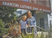 ?? Gabrielle Lurie / The Chronicle ?? Brooklynn Conway, 10, and mom Jennifer Conway at Bayside Martin Luther King Jr. Academy, which Brooklynn will be attending.