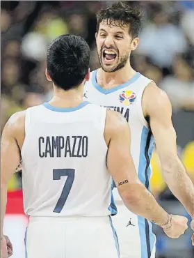 ?? FOTO: AP ?? Nico Laprovitto­la y Facu Campazzo, celebrando la victoria de Argentina