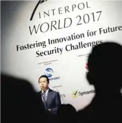 ??  ?? SINGAPORE: Interpol President, Meng Hongwei, delivers his opening address at the Interpol World congress yesterday in Singapore. — AP