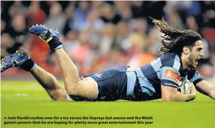  ??  ?? > Josh Navidi crashes over for a try versus the Ospreys last season and the Welsh game’s powers-that-be are hoping for plenty more great entertainm­ent this year