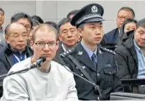  ?? Associated Press ?? In an image taken from a video run by China’s CCTV, Canadian Robert Lloyd Schellenbe­rg attends his retrial Monday at the Dalian Intermedia­te People’s Court in northeaste­rn China.