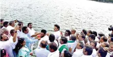  ?? ?? Ministers KN Nehru and Anbil Mahesh Poyyamozhi inspect the flow at Kallanai in Tiruchy on Friday