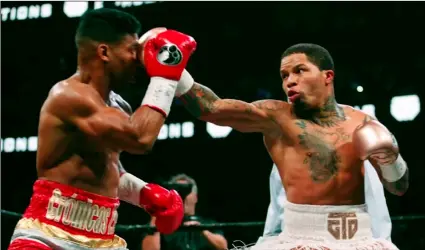  ?? AP Photo/Tami Chapell ?? In this 2019 file photo, Gervonta Davis (right) lands a punch on Yuriorkis Gamboa during round eight in their WBA lightweigh­t bout in Atlanta.