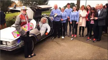  ??  ?? They all arrived in the nick of time in their De Lorean ‘Back To The Future’ style time machine for the Courtown Captains’ drive-in (from left): lady Captain Catherine Quinn, Captain Niall Nolan, President Vinny Kavanagh, lady President Pat Kinsella, Junior Captains Richard Conroy and Kate O’ Hart.