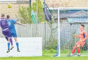  ?? PHOTOS: Paul Gillis ?? Odd Down (blue) exited the FA Vase courtesy of a 4-1 defeat to Willand Rovers