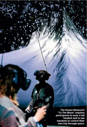  ??  ?? The Dowse Museum’s ‘‘To The Moon’’ requires participan­ts to wear a full headset and to use handsets to control their own trip through space.