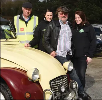  ?? By Michelle Cooper Galvin. Photo ?? Sean O’Donoghue (third from left) with his 1973 Citreon. With Tom Wharton, Eilis and Aoife Cronin