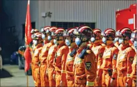  ?? ?? Members of the rescue team assemble at a duty station in Nanning before leaving for the search mission.