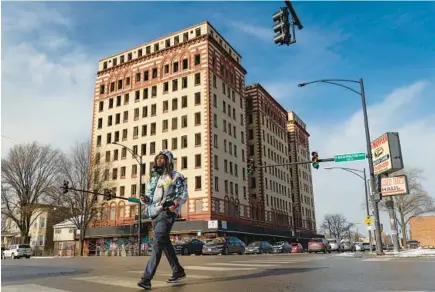  ?? ?? The decaying Guyon Hotel, originally built in 1928, stands empty in West Garfield Park on Jan. 18, 2024.