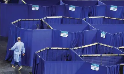  ??  ?? A Covid-19 vaccinatio­n centre at Saint-Quentin-en-Yvelines velodrome near Paris. Photograph: Ian Langsdon/EPA