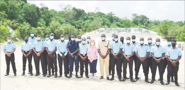  ??  ?? US Ambassador Sarah-Ann Lynch (centre) with ranks from the Guyana Police Force who participat­ed in marksmansh­ip training yesterday.