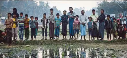  ?? FILE PIC ?? Rohingya refugees waiting for rations at a camp in Cox’s Bazar, Bangladesh.