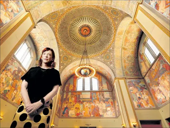  ?? Mel Melcon Los Angeles Times ?? “THIS IS an amazing story,” Susan Orlean says of the questions still surroundin­g the 1986 fire, the largest ever at a U.S. library. Behind her is the library’s rotunda.