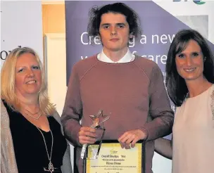  ??  ?? ●●Overall Stockport Star winner Kieran Dinan with Lucy Cunliffe (left), of Stockport Together, and awards presenter Annabel Tiffin (right)