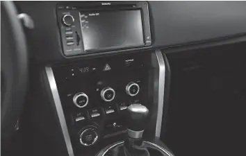  ??  ?? A new multi-function display, with rear-view camera and performanc­e data, is offered on Subaru’s new BRZ coupe.