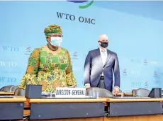  ?? — AFP photo ?? Ngozi (left) stands prior to a session of the WTO General Council upon her arrival at the WTO headquarte­rs to takes office in Geneva.