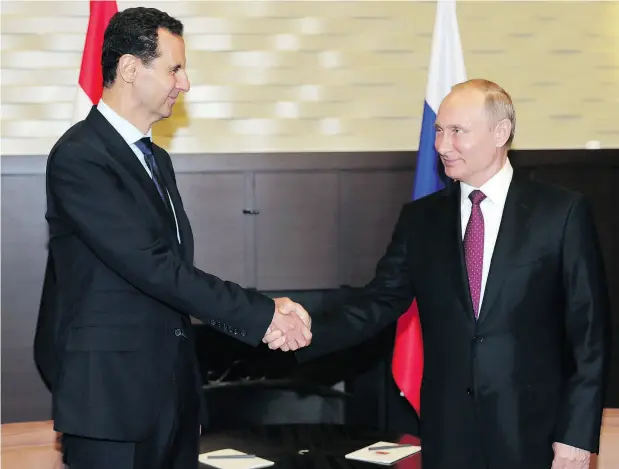  ?? MIKHAIL KLIMENTYEV / AFP / GETTY IMAGES FILES ?? Syrian president Bashar al-Assad’s boast that he intends to retake the Golan Heights that were lost to Israel in the 1967 war could draw Russian President Vladimir Putin into a very dangerous and unstable situation, says David J. Bercuson.