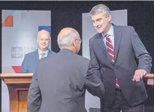  ?? CP PHOTO ?? Nova Scotia Liberal Leader Stephen McNeil, right, shakes hands with N.S. NDP Leader Gary Burrill as Progressiv­e Conservati­ve Leader Jamie Baillie, left, looks on at a leaders’ debate in Halifax on Thursday. The provincial election will be held Tuesday,...