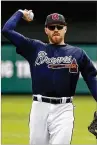  ?? JOHN RAOUX / ASSOCIATED PRESS ?? Freddie Freeman has been cleared to begin throwing and could start hitting Friday in his comeback from a broken wrist.