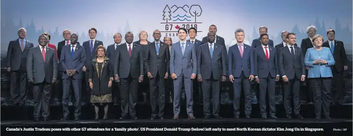  ?? Photo / AP ?? Canada’s Justin Trudeau poses with other G7 attendees for a ‘family photo’. US President Donald Trump (below) left early to meet North Korean dictator Kim Jong Un in Singapore.