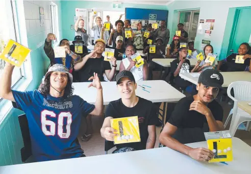  ?? Picture: JUSTIN BRIERTY ?? ROAD WORTHY: Heraini Mere (18), Jessie Wason (17) and Charles Thomas joined with up to 90 Cairns youths who obtained their driver’s licences at the Mooroobool Hub.