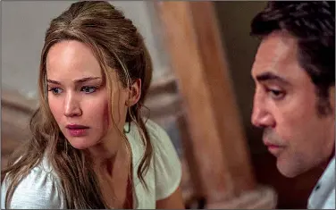  ??  ?? Jennifer Lawrence and Javier Bardem are a nameless couple content with rehabilita­ting their gorgeous Victorian house before mysterious visitors show up in Darren Aronofsky’s Mother!