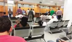  ??  ?? KUWAIT: Some expats are pictured at the Immigratio­n Department. Confusion over incorrect data on work visas has left many expats stranded and unable to travel out of Kuwait for holiday.